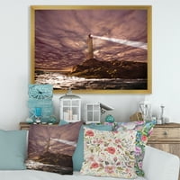 Designart 'Lighthouse Shining Light During Stormy Clouds Night I' Nautical & Coastal Framed Art Print